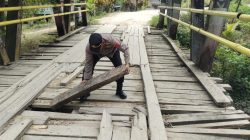 Kapolres Buton Utara Perintahkan Kapospam Ops Lilin Nataru Cek dan Lakukan Perbaikan Darurat Jembatan Rusak