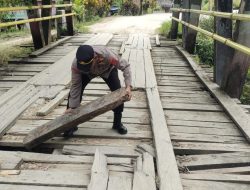 Kapolres Buton Utara Perintahkan Kapospam Ops Lilin Nataru Cek dan Lakukan Perbaikan Darurat Jembatan Rusak